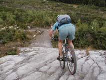 Me starting descent of steep 12m granite slab.