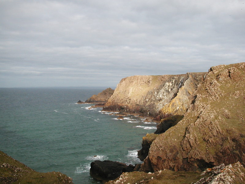 Steep rocky cliffs in the sun.